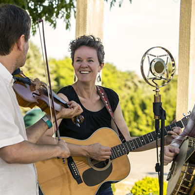 A folk band plays at Fox Run Vineyards for the Grapes, Griddles, and Fiddles event.