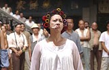 SONY PICTURES ENTERTAINMENT - A chain-smoking landlady with a mean roundhouse: Yuen Qiu in Kung Fu Hustle.
