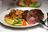 PHOTO BY MIKE HANLON - A filet mignon and vegetables served at Grinnell's. The Monroe Avenue chophouse is a Rochester staple, having existed for more than 50 years.