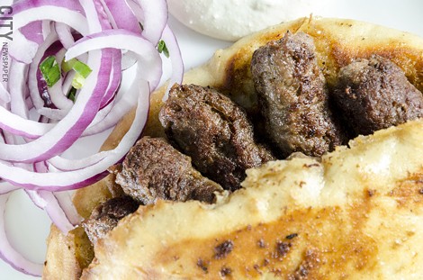 Cevapi made with spiced ground beef from Mamma Lucia. - PHOTO BY MARK CHAMBERLIN