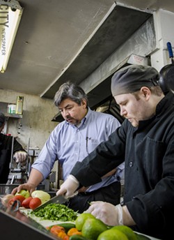 Jose Abarca and Joel Allatt in the kitchen at Itacate. - PHOTO BY MARK CHAMBERLIN