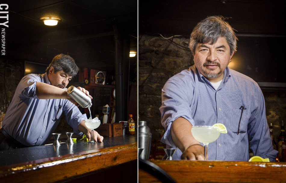 Jose Abarca pours a margarita with fresh lime juice  at Itacate in Penfield. Jose and his wife, both natives of Mexico, are making a point to use traditional family recipes for authentic Mexican meals. - PHOTO BY MARK CHAMBERLIN