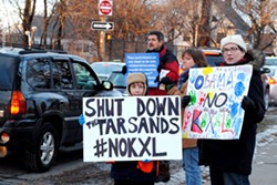 Local residents lined Culver Road to protest the Keystone XL pipeline proposal. - PHOTO BY JEREMY MOULE