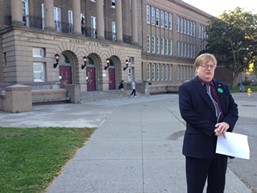 Mayoral candidate Alex White outside Monroe High School. - PHOTO BY CHRISTINE CARRIE FIEN