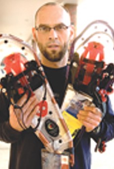 Medved's Mort Nace shows off some modern snowshoes; the Rochester area is home to several annual competitive snowshoeing events