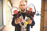 PHOTO BY JEFFREY MARINI - Medved's Mort Nace shows off some modern snowshoes; the Rochester area is home to several annual competitive snowshoeing events