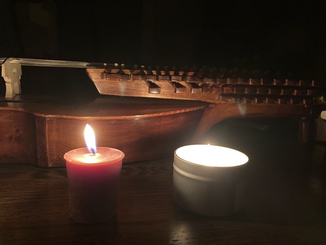 Swedish nyckelharpa and candles
