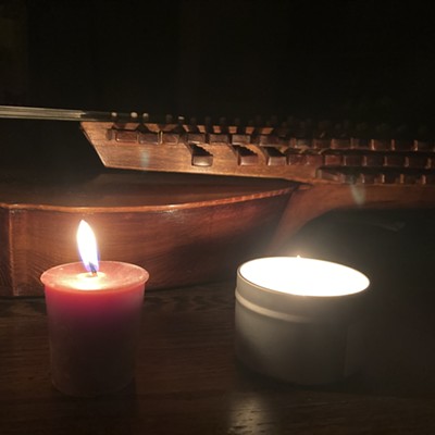 Swedish nyckelharpa and candles