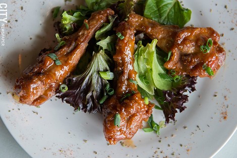 The sweet-and-sour duck-wing appetizer from Roam Cafe. - PHOTO BY THOMAS J. DOOLEY