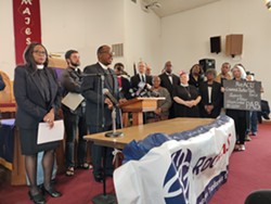 The Rev. James Simmons, right, and the Rev. Wanda Wilson, left, were among the speakers at a press conference today urging City Council  not to amend its Police Accountability Board legislation to allow former law enforcement officers to serve on the body. - PHOTO BY JEREMY MOULE