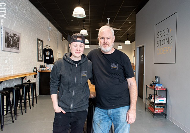 Father-daughter team Bill Bly (right) and Bly run Seed + Stone Cidery at The Hungerford Building. - PHOTO BY JACOB WALSH