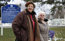 Carolyne Blount, left, researched many of the stories featured in “Beyond These Gates: Mountains of Hope in Rochester’s African-American History,” a book Marilyn Nolte, right, co-authored with African-American history scholar Verdis Robinson. - PHOTO BY MAX SCHULTE