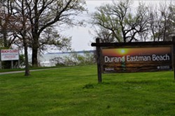 The welcome sign at Durand Eastman Beach. - PHOTO BY GINO FANELLI