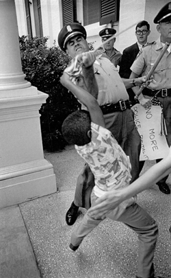 Herron, who helped chronicle the civil rights movement, captured this image in Jackson, Mississippi, in 1965. - PHOTO BY MATT HERRON