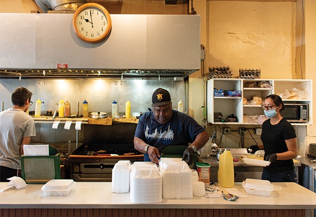 James Brown trains two new employees at his diner, James Brown's Place. He expects that the deal to sell the restaurant will close in early October 2020. - PHOTO BY JACOB WALSH