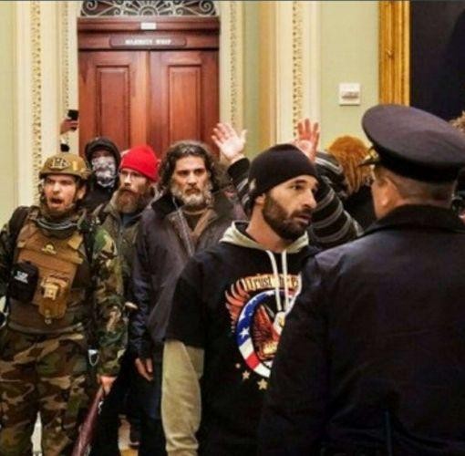 Insurrectionists stormed the Capitol on Jan. 6, 2021. Federal prosecutors say the bearded man in the center of the photo is Dominic Pezzola of Rochester. - PHOTO COURTESY U.S. ATTORNEY'S OFFICE