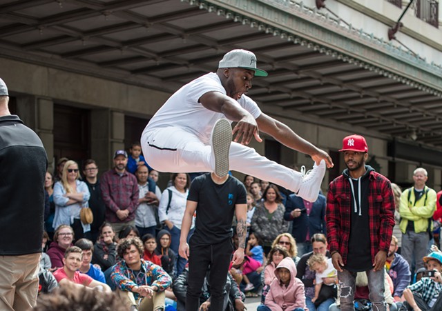 Rishone Todd dances during Fringe Street Beat as part of 2018 Rochester Fringe Festival. - PHOTO BY AARON WINTERS