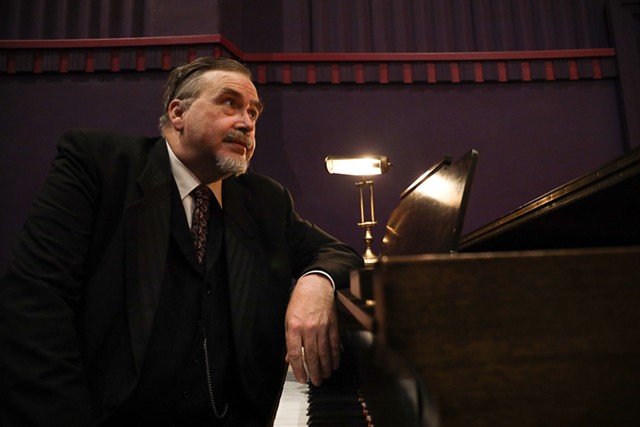 Philip Carli, of the George Eastman Museum's Dryden Theatre, is one of about three dozen silent film accompanists around the country. - PHOTO BY MAX SCHULTE