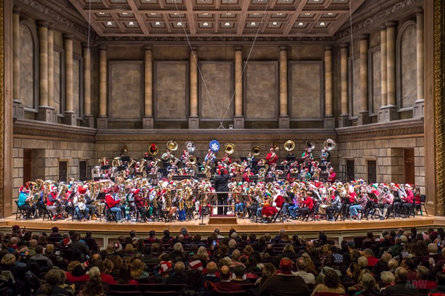 Though the annual Tuba Christmas at Eastman Theatre's Kodak Hall is free, the concert regularly "sells out" the day tickets become available. - PHOTO BY AARON WINTERS