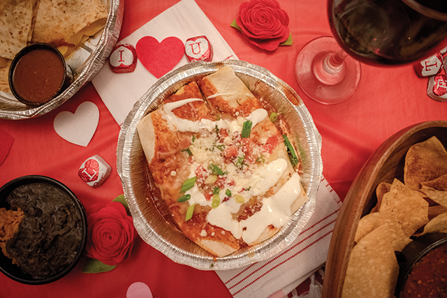 If you don't feel like getting gussied and heading out into the winter — and crowds — with your valentine, but don't want to cook, either, consider these take-out options. Pictured: chicken enchiladas from Silver Iguana. - PHOTO BY RYAN WILLIAMSON