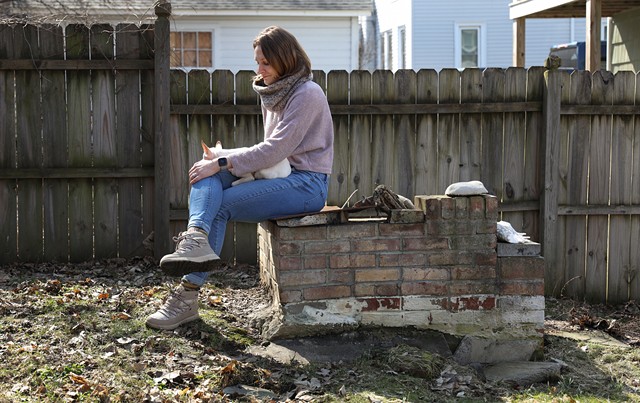 The fire pit in Alison Livada's backyard used to be an underground bunker. - PHOTO BY MAX SCHULTE