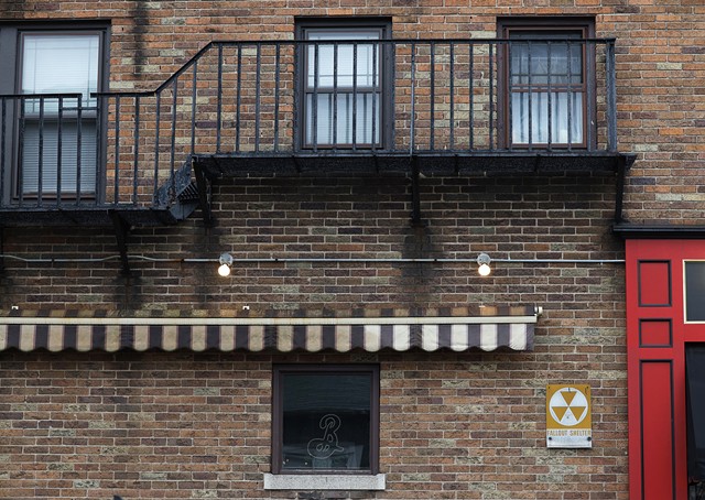 There were hundreds of public fallout shelters around Rochester in the 1960s and 1970s, including one in the apartment building that now houses Turcott's Taproom on Monroe Avenue. - PHOTO BY MAX SCHULTE