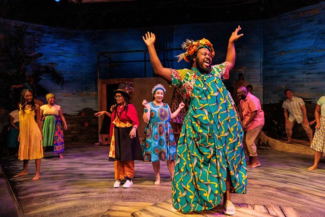 Alvis Green Jr. (foreground) as Asaka, Mother of the Earth, with the ensemble cast of "Once on This Island." - PHOTO BY RON HEERKENS JR./GOAT FACTORY MEDIA