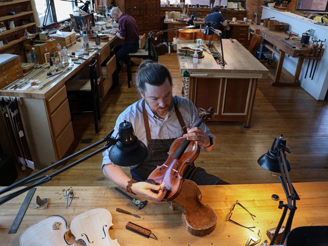 Sam Payton learned his craft as an apprentice to Chris Germaine, a master violinmaker. - PHOTO BY MAX SCHULTE