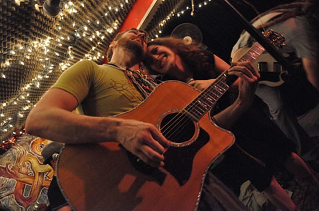 From left, Rochester musician Seth Faergolzia and Regina Spektor on stage. - PHOTO BY DANIEL SIERADSKI.