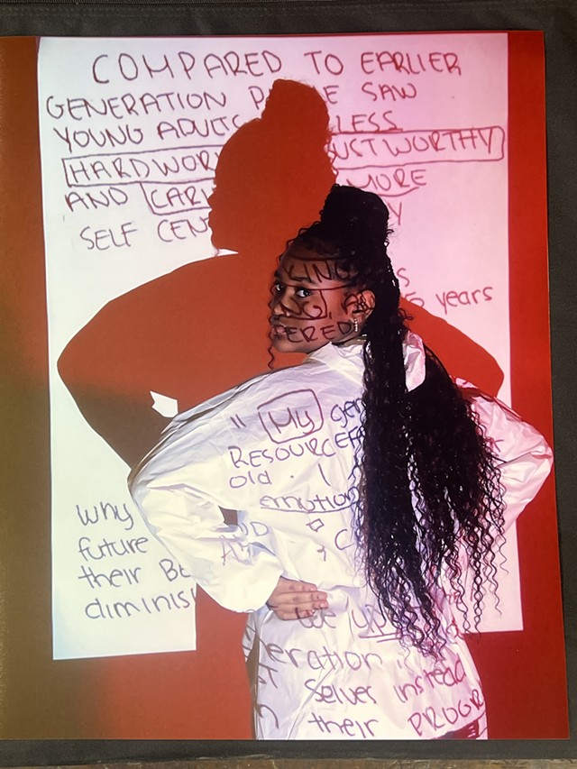 Abigael Moreau, 15, worked on her self-portrait, "Generational Stereotypes," which will be displayed at the George Eastman Museum. - PHOTO PROVIDED.
