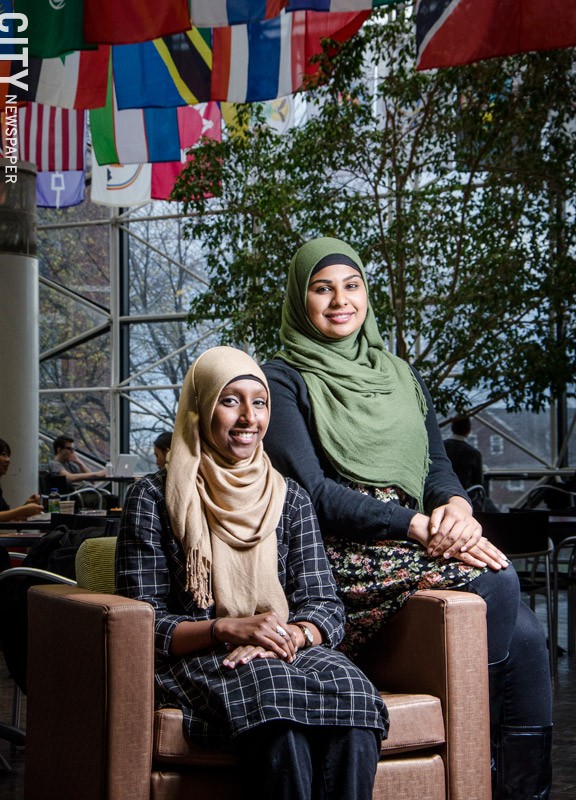 Manal Sidi, seated, and Lailun Nahar. - PHOTO BY MARK CHAMBERLIN