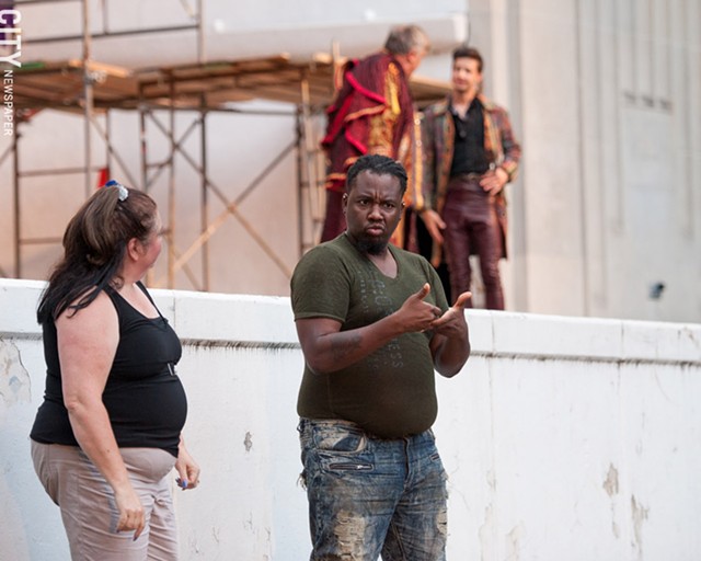 Members of Dangerous Signs interpret a production of "Romeo and Juliet" at Highland Bowl. The group is now rehearsing for shows taking place at the Rochester Fringe Festival in September. - PHOTO BY JOSH SAUNDERS
