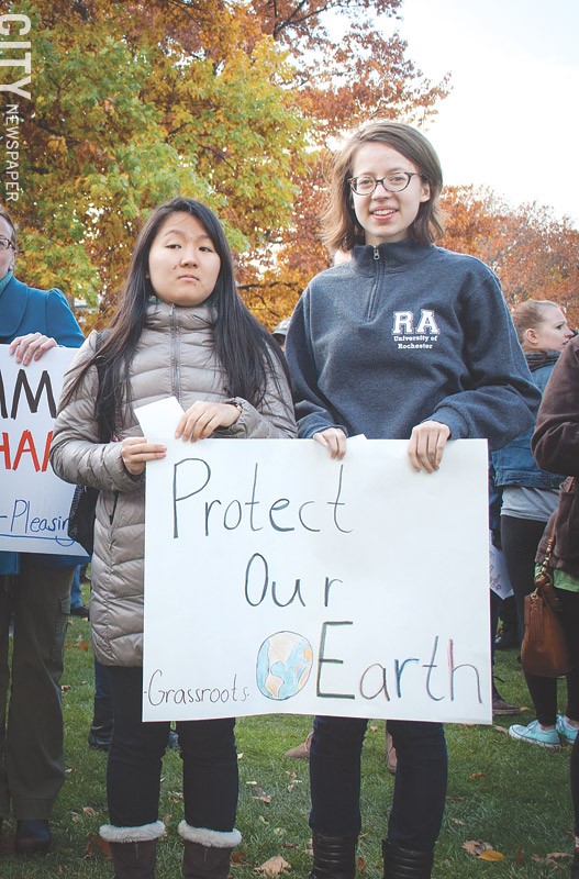 The Trump administration has proposed doing away with important environmental and climate - programs and rules. During a November anti-Trump rally at the University of Rochester, several participants showed their concern. - PHOTO BY RYAN WILLIAMSON