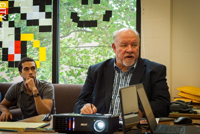 John Klofas (right), director of the Center for Public Safety Initiatives at RIT, and research assistant and graduate student Aaron Baxter. - PHOTO BY RYAN WILLIAMSON