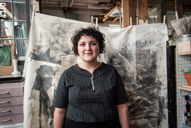 Rebecca Lomuto in her studio at The Yards, in front of one of her photographic installations. - PHOTO BY RYAN WILLIAMSON
