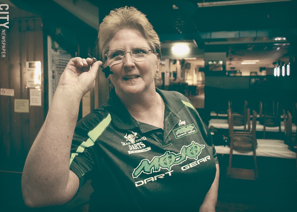 Amy DeBruyne is Rochester's top-ranked woman steel-tip darts player. - PHOTO BY RYAN WILLIAMSON