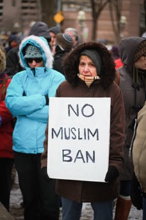 Photo Gallery: Rally Draws Opposition To Trump's Ban