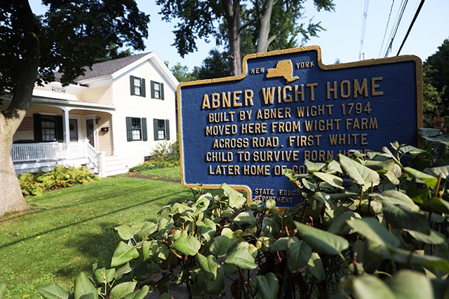 A New York historical marker denoting the Abner Wight Home celebrated the “first white child” of Perinton. The sign was erected in 1949 and taken down in September 2020.