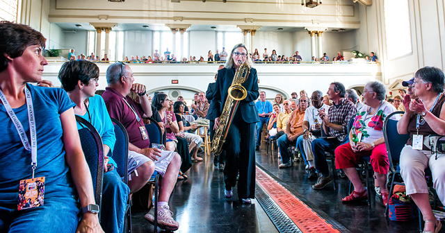 Holly Cole'S band makes an entrance at Harro East Ballroom during the Rochester International Jazz Festival, pre-pandemic, in 2015.