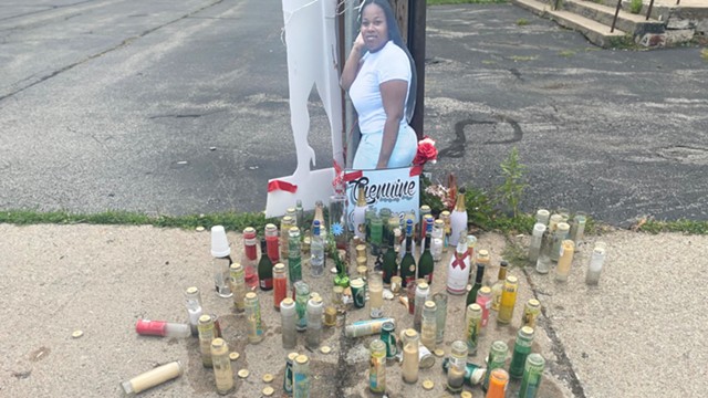 A makeshift memorial for Genuine Ridgeway, a 31-year-old mother of two, killed just steps from the First Church of God on Clarissa Street in June.