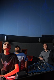 (Left to right) Drummer Tommy Mintel, Steve Fentress, bassist Luis Carrion, keyboardist Ian Sherman and guitarist Brother Wilson at the Strasenburgh Planetarium.