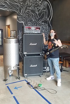Undeath guitarist Kyle Beam, providing riffs for Nine Maidens' new beer.