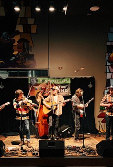 Center, singer/guitarist Ray Mahar, with fiddle player Zac Lijewski, banjoist Brad DeLano, and upright  bassist Aubrey Baldauf (all of Mahar’s band, A Girl Named Genny); mandolinist Scott Halpin of The Honey Smugglers; and guitarist Karis Gregory of Public Water Supply.