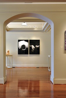 An installation view of "The Human Figure" at Main Street Arts. Left to right: a photo by Steven Romeo, a drawing by Danielle Bersch, two photos by Susan D'Amato, a painting by Robert Samartino, and a mixed-media work by Tina Ybarra.