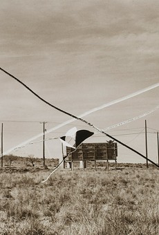 Thomas F. Barrow's 1974 photo, "Flight Field, Albuquerque," is part of "Sight Reading: Photography and the Legible World," on view at George Eastman Museum.