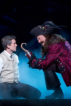 Kevin Kern as J.M. Barrie and Tom Hewitt as Captain Hook in the national tour of "Finding Neverland," now on stage at the Auditorium Theatre