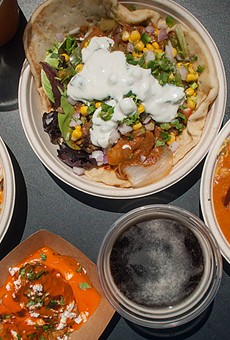 At Naan-Tastic, diners can customize bowls, rolls, or Naan-tacos. From left: The college bowl, (top) Naan taco with lamb keema, (right) bowl with vegan chana masala, and (bottom) Makhani Samosa.