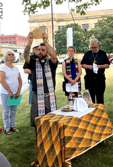 Rochester clergy hold Eucharist in support of migrants
