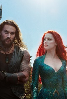 Jason Momoa and Amber Heard in
&quot;Aquaman.&quot;