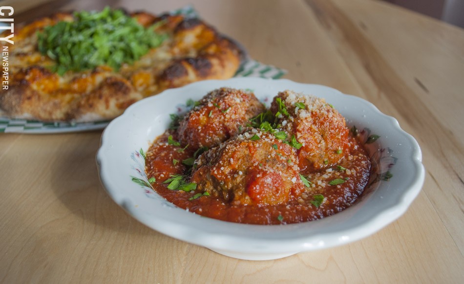 Papalee's meatballs, served with red sauce and cheese. - PHOTO BY RENÉE HEININGER